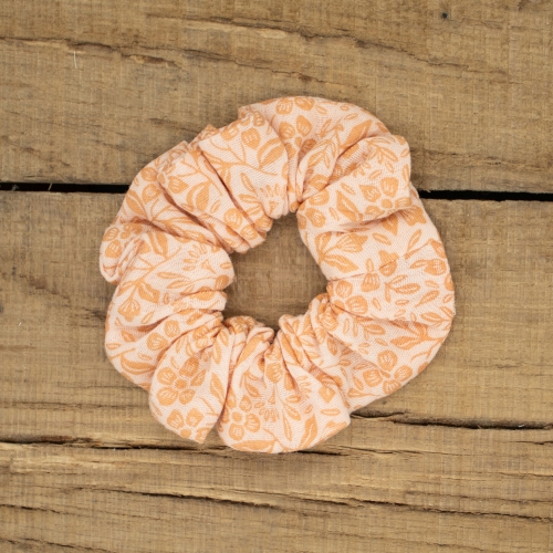 Chouchou en coton orangé à motifs fleuris – accessoire cheveux Petit Fripon fait main