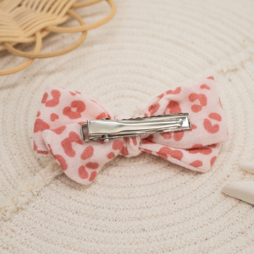 Nœud motif léopard rose