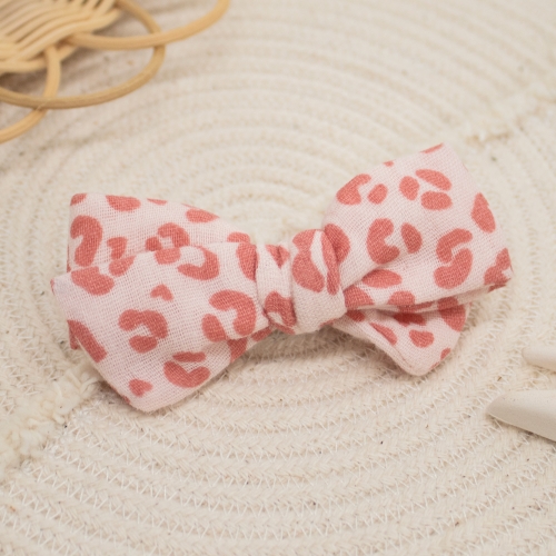 Nœud motif léopard rose