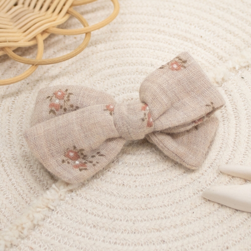 Nœud petites fleurs roses sur double gaze gris beige